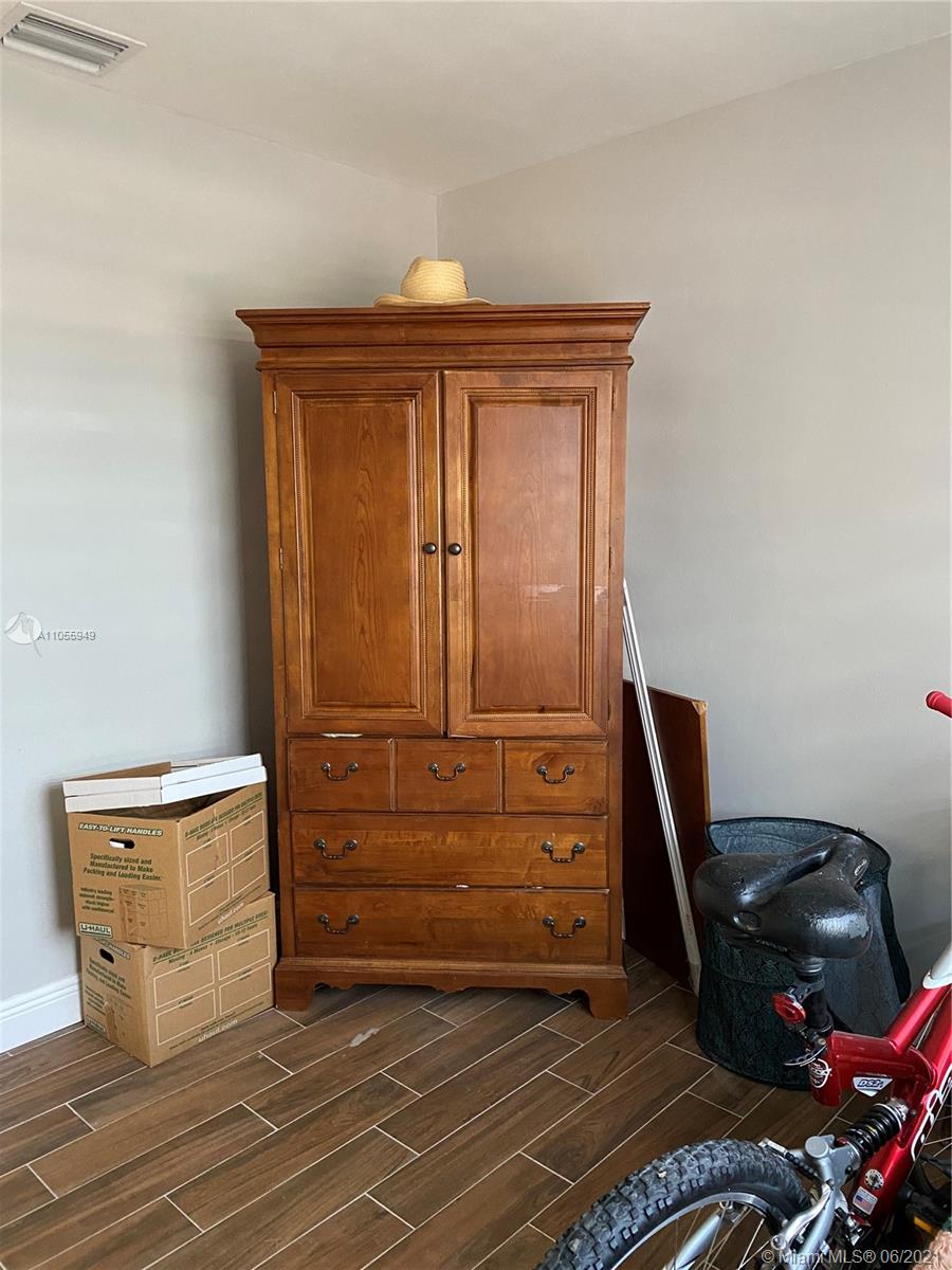 7565 Southwest 28th Street Road Miami, FL 33155 - Photo 22 of 31 a view of a dresser