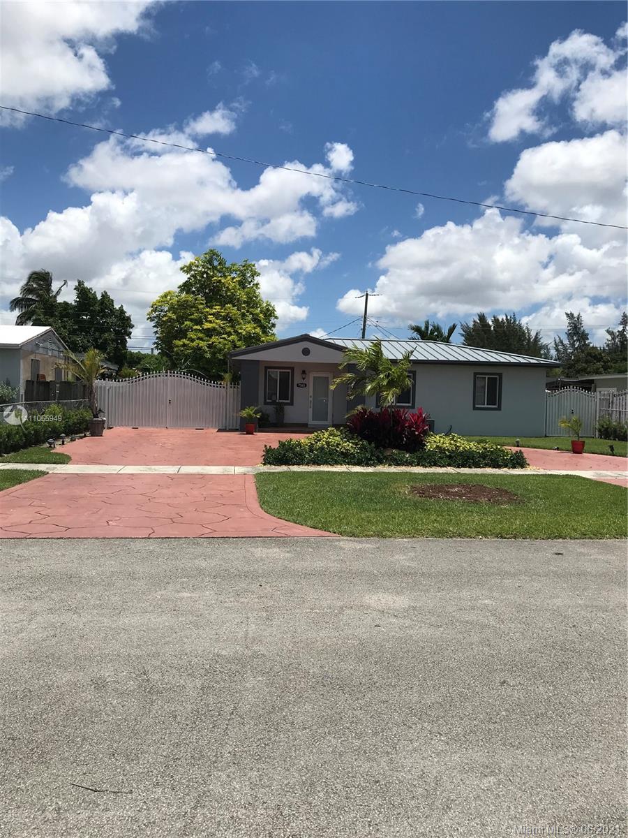 7565 Southwest 28th Street Road Miami, FL 33155 - Photo 9 of 31 a view of swimming pool is middle in front of the house