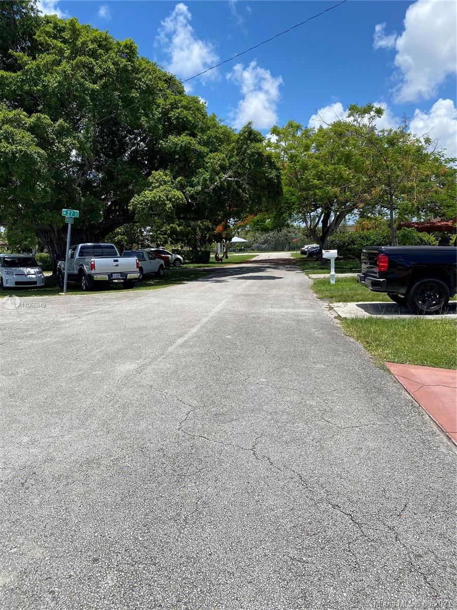 7565 Southwest 28th Street Road Miami, FL 33155 - Photo 10 of 31 a car parked on the side of the road