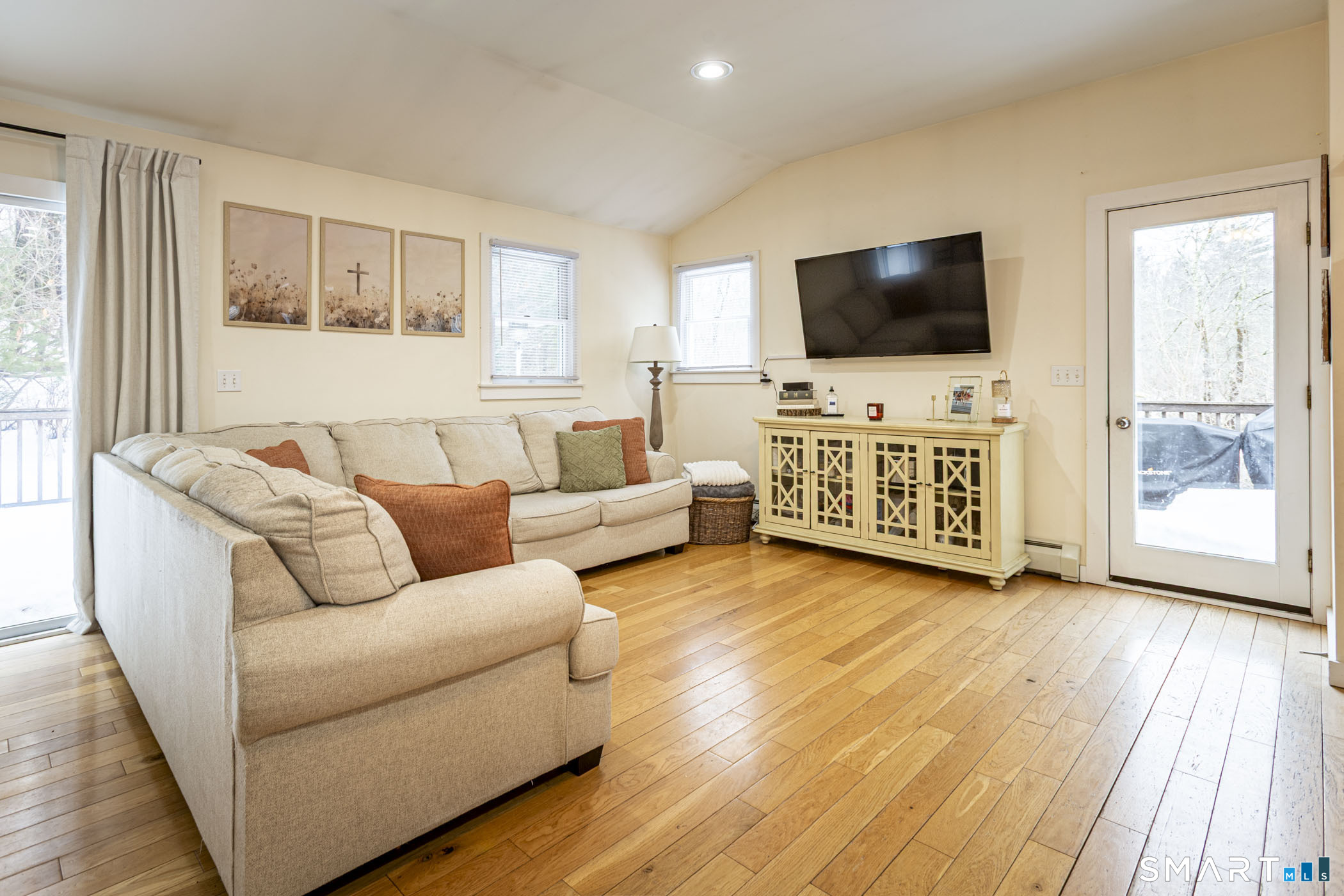 429 Lakeside Road Morris, CT 06763 - Photo 19 of 38 a living room with furniture and a flat screen tv