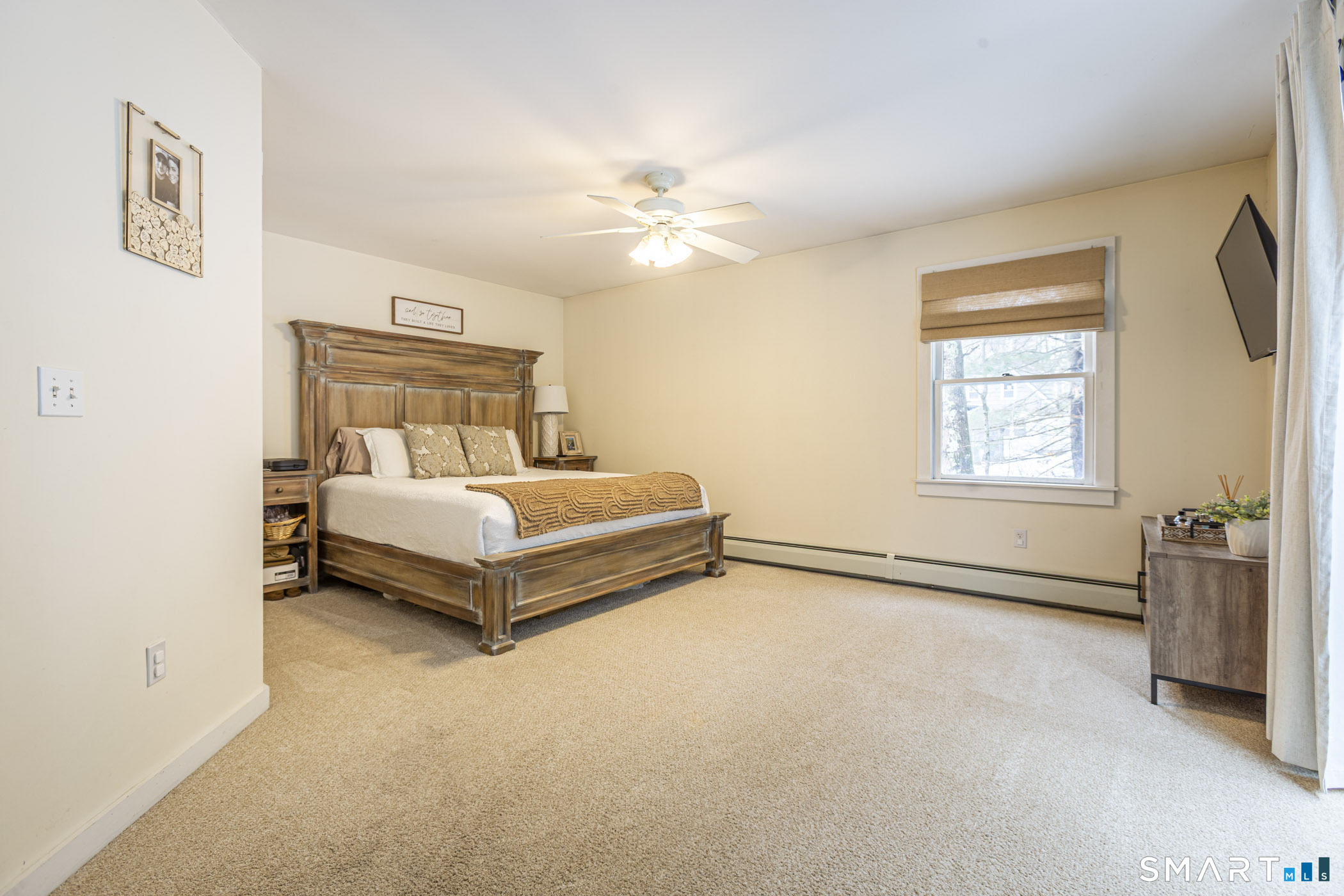 429 Lakeside Road Morris, CT 06763 - Photo 23 of 38 a bedroom with a bed and a window
