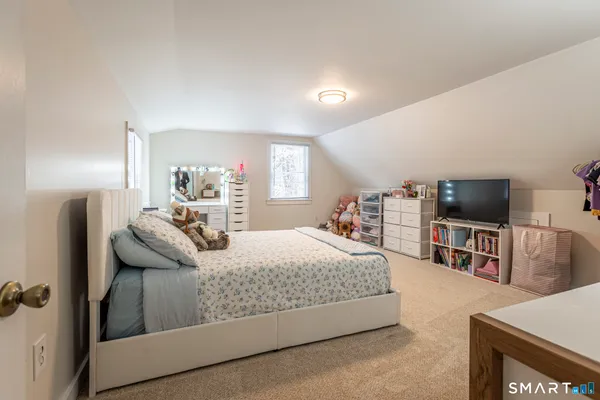 a kitchen with a sink cabinets and window