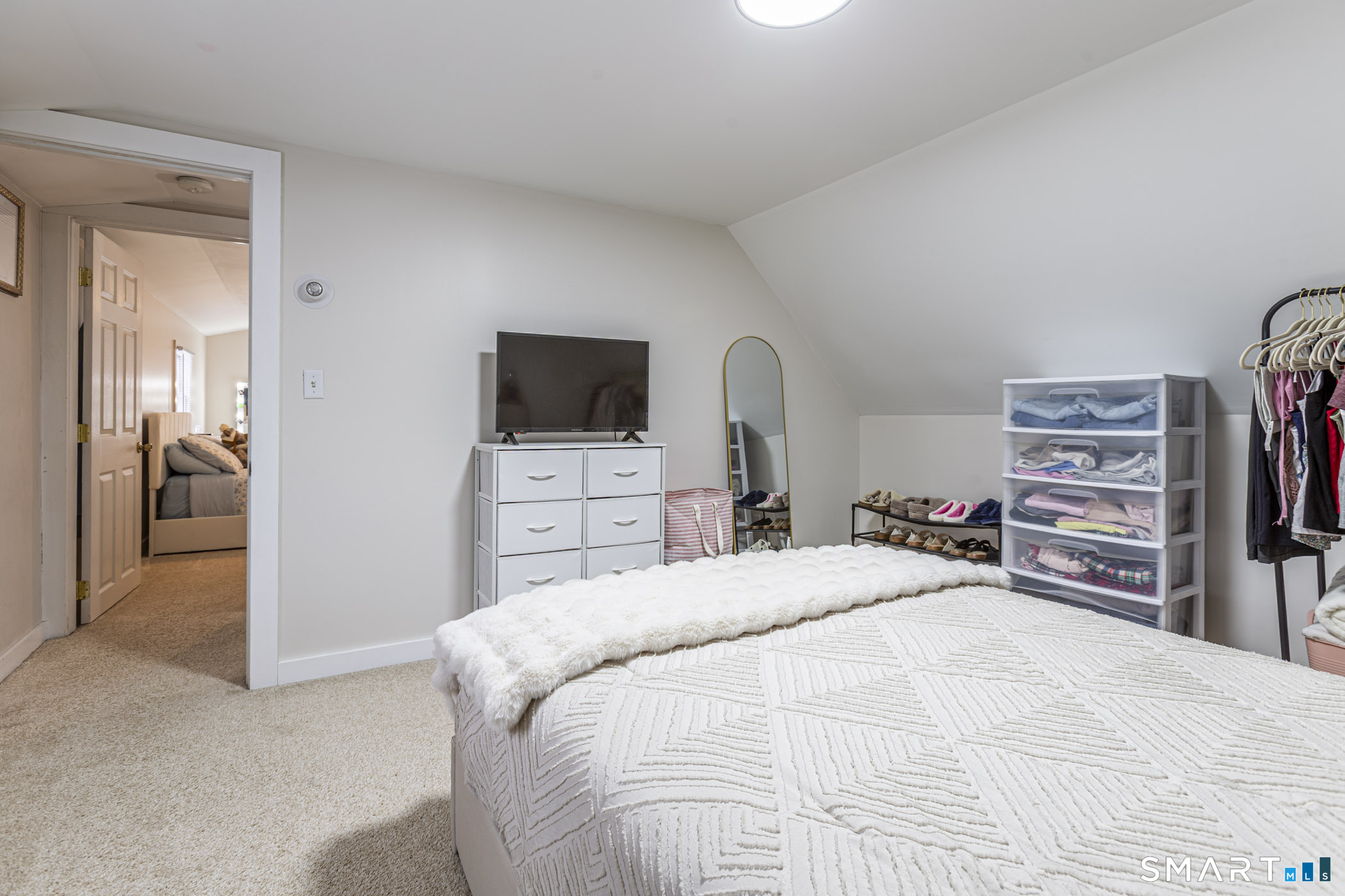 429 Lakeside Road Morris, CT 06763 - Photo 4 of 38 a bedroom with a bed and a television