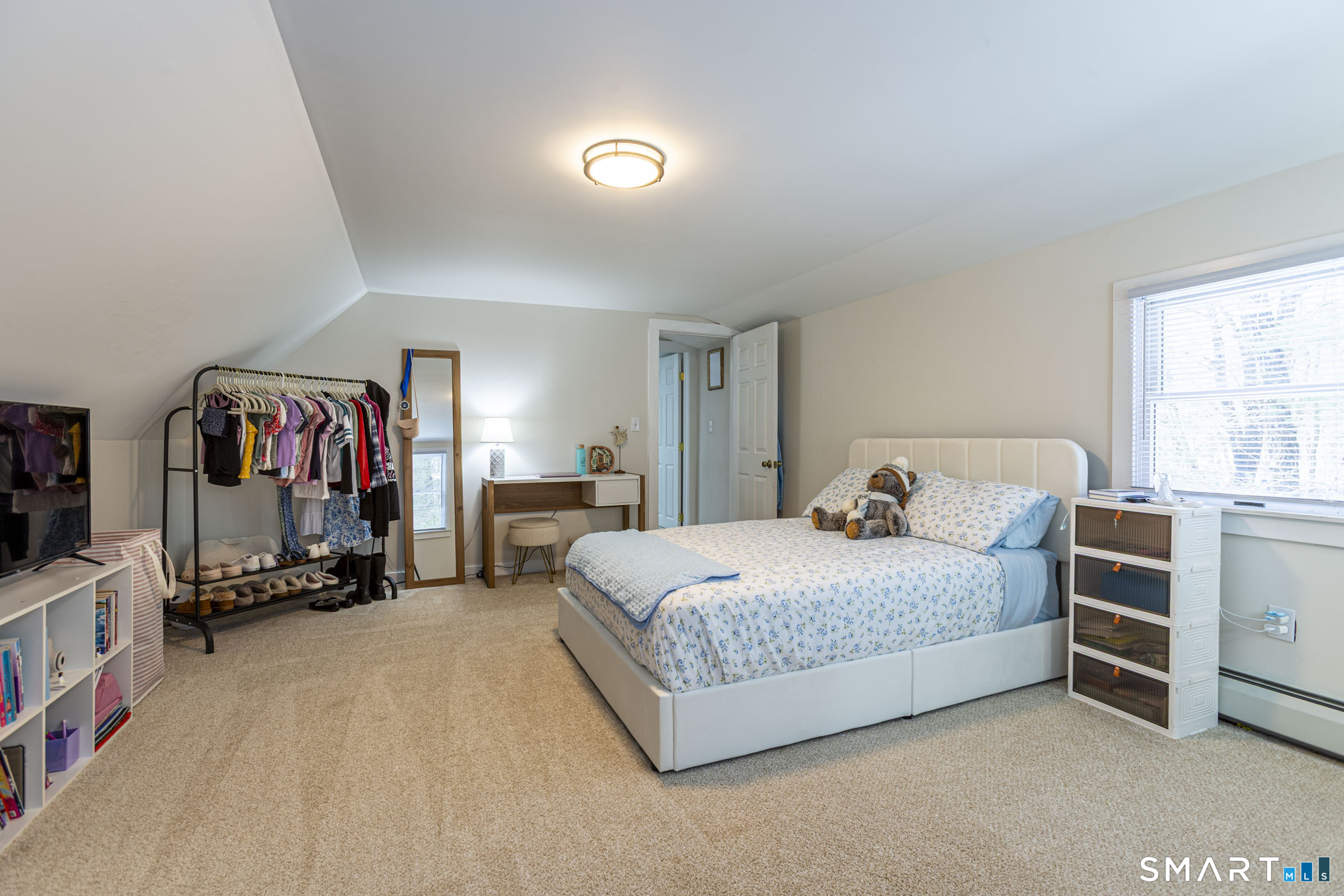 429 Lakeside Road Morris, CT 06763 - Photo 8 of 38 a bedroom with a bed and a window