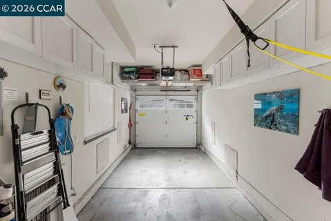 a kitchen with a refrigerator and sink