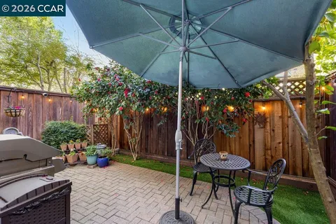 a couple of table and chairs in the patio