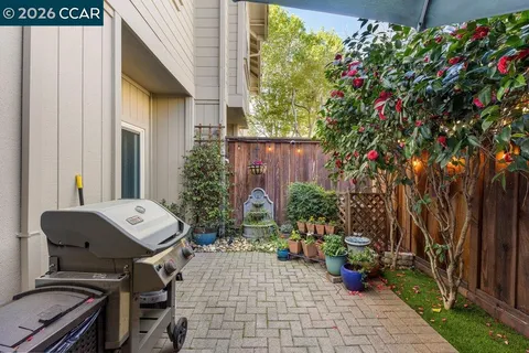 a view of a swimming pool with sitting area