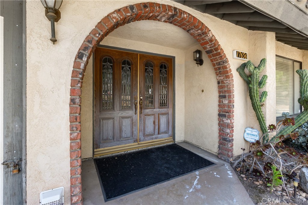 17656 Mockingbird Hill Circle Riverside, CA 92504 - Photo 4 of 49 a view of a entryway door of the house