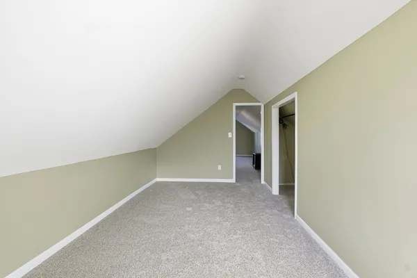 a view of hallway with closet