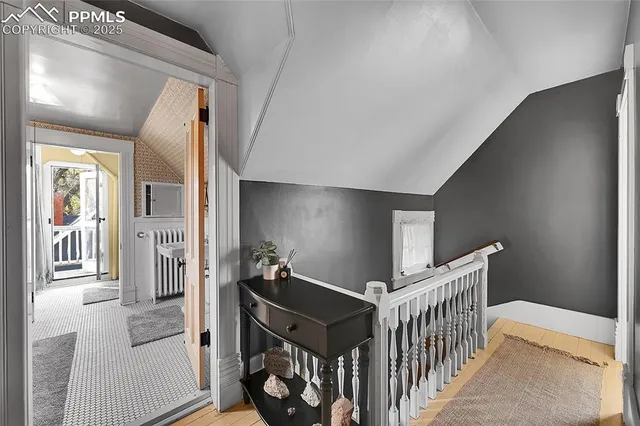 a view of entryway with wooden floor