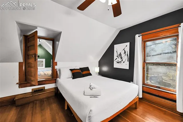 a view of a living room and a large window