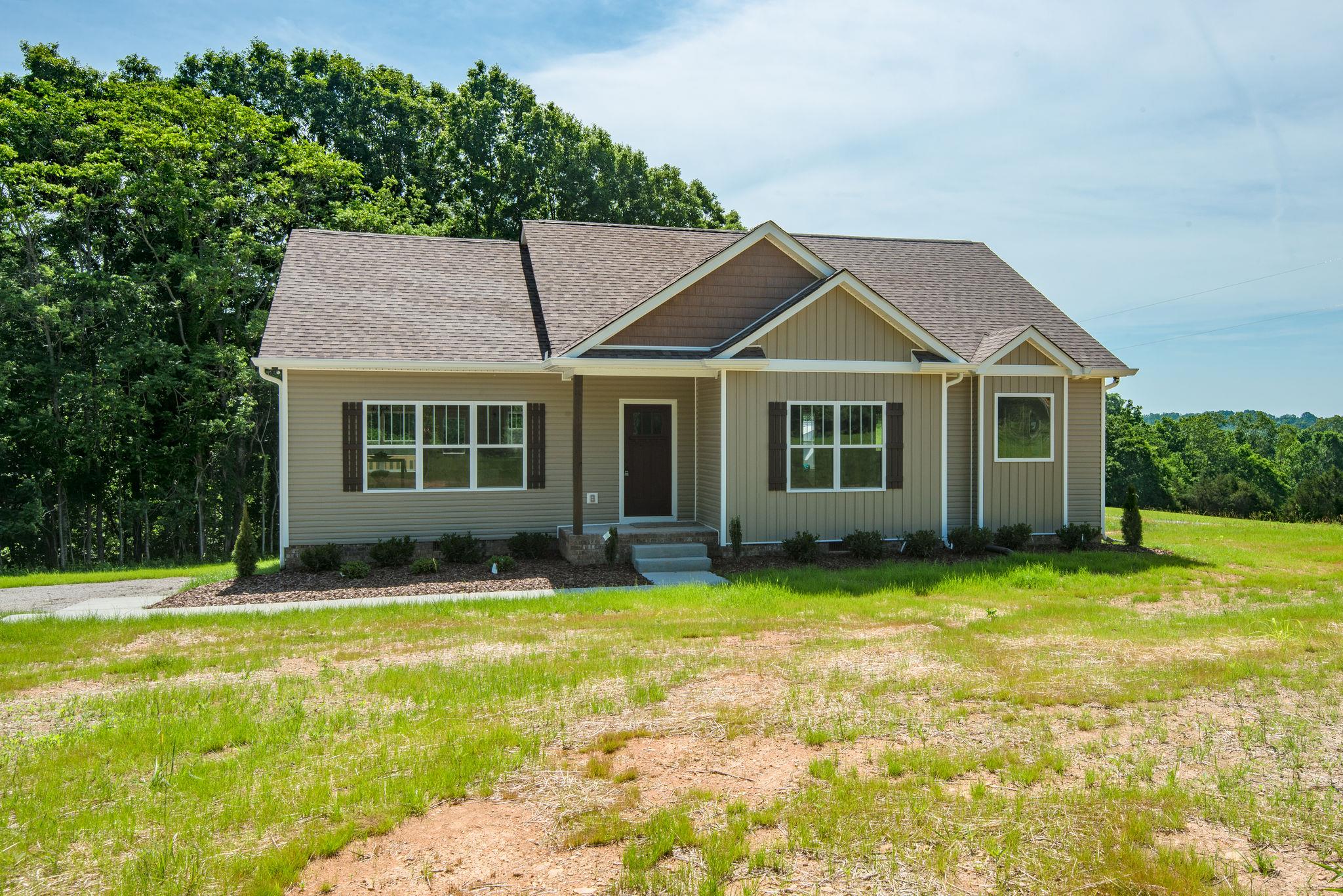 1507 East Piney Road Dickson, TN 37055 - Photo 25 of 30 a view of a house with a swimming pool