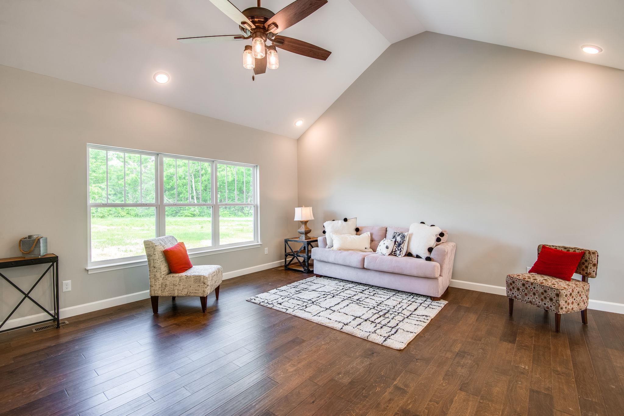 1507 East Piney Road Dickson, TN 37055 - Photo 6 of 30 a living room with furniture and wooden floor