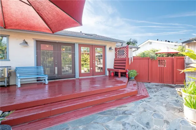 a view of a pathway with a flower garden