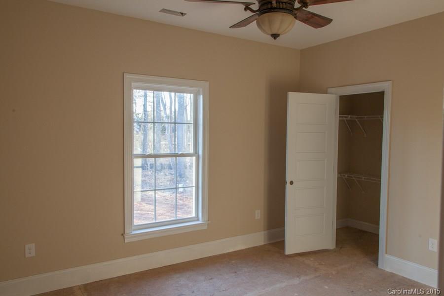707 Cooks Cove Ridge Clover, SC 29710 - Photo 14 of 18 a view of a livingroom with a window and a ceiling fan