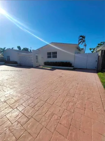a house view with a outdoor space
