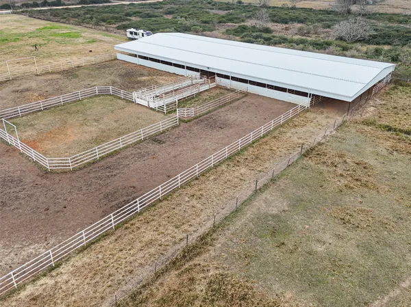 a white and white wall with a white refrigerator