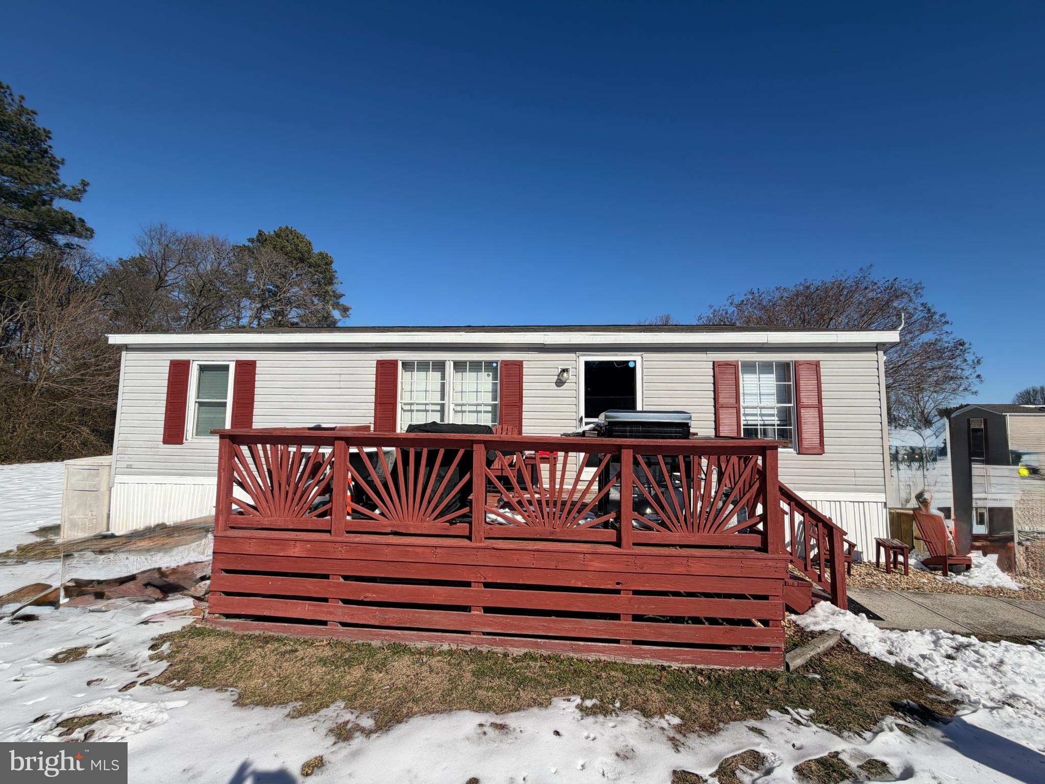 Charming home with a welcoming deck.