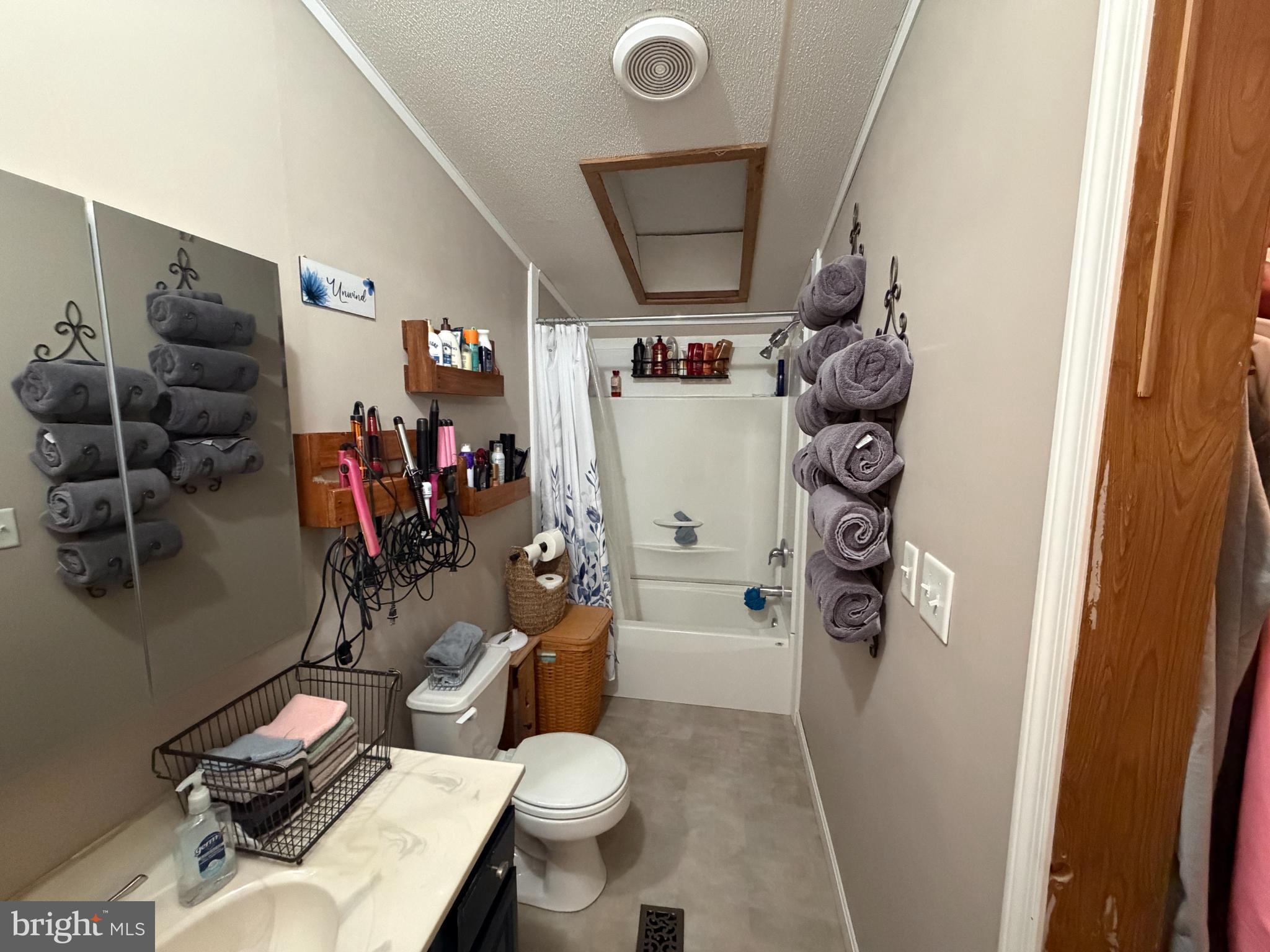 444 Long Branch Road Seaford, DE 19973 - Photo 12 of 22 Charming bathroom with organized essentials.