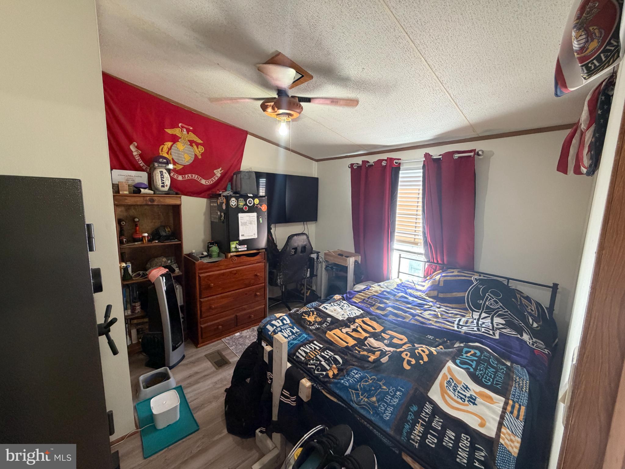 444 Long Branch Road Seaford, DE 19973 - Photo 14 of 22 Cozy bedroom with personal touches and flair.