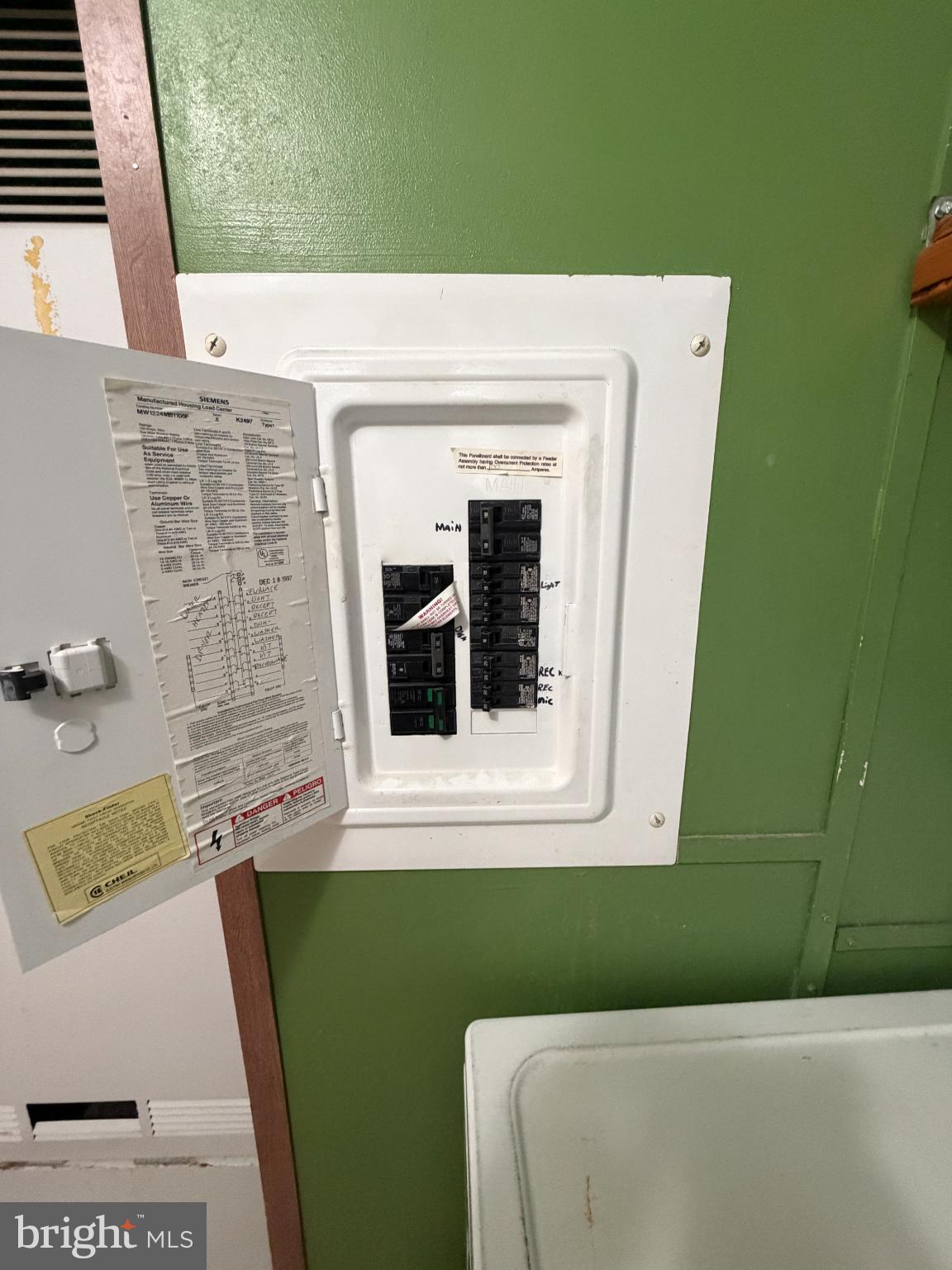 444 Long Branch Road Seaford, DE 19973 - Photo 17 of 22 Utility panel in vibrant green setting.