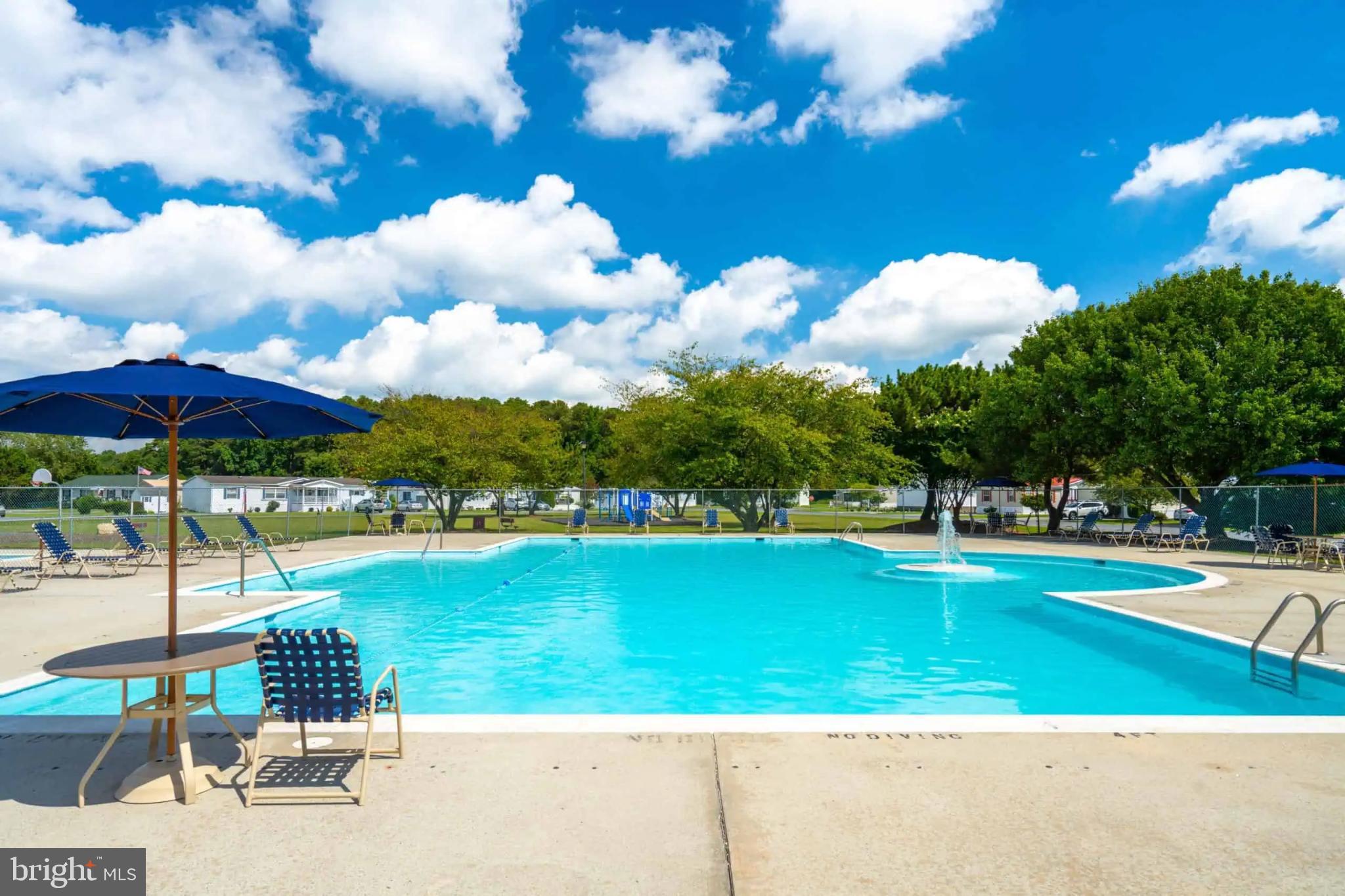444 Long Branch Road Seaford, DE 19973 - Photo 19 of 22 Sunny oasis with a sparkling pool.