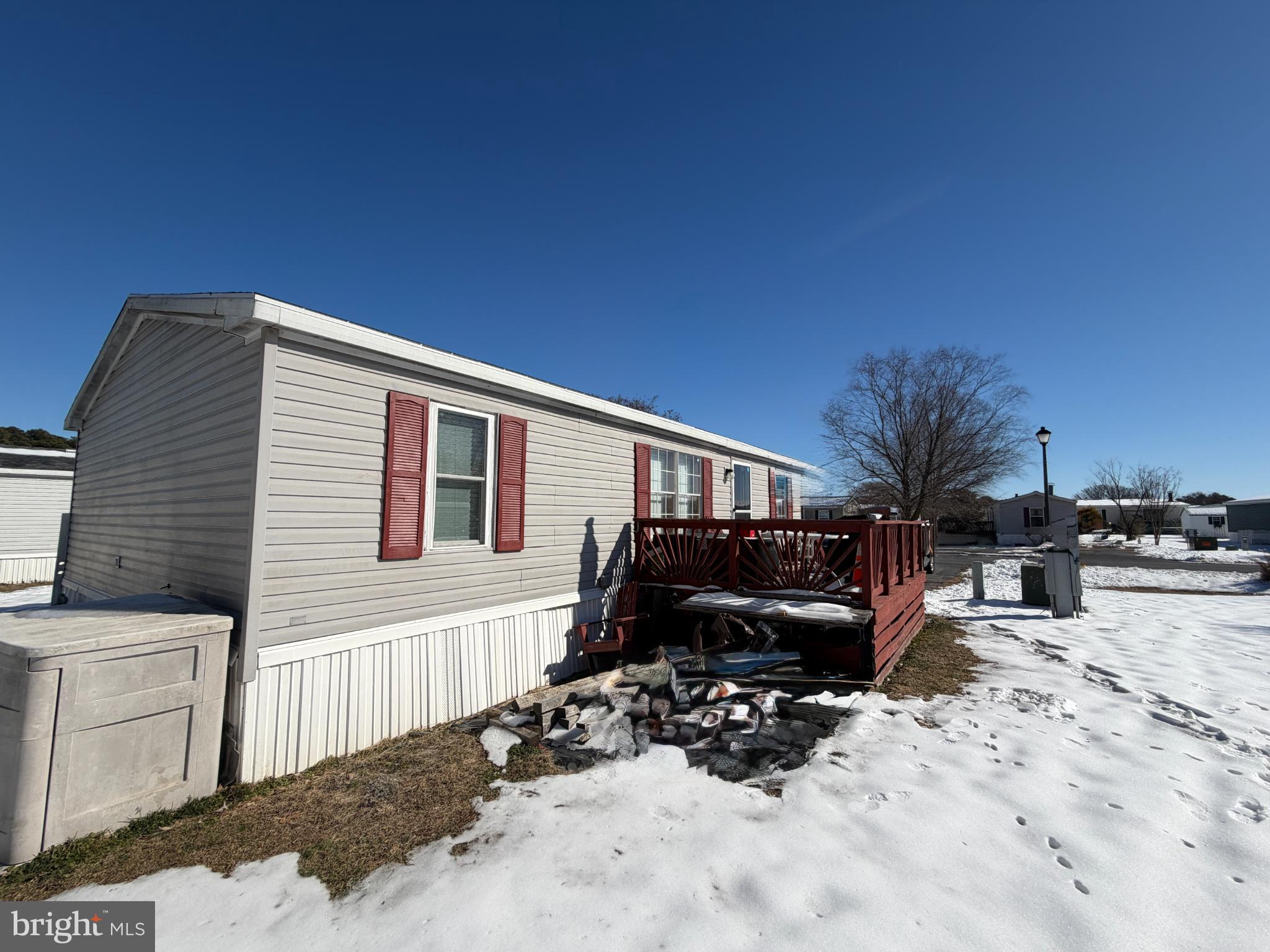 444 Long Branch Road Seaford, DE 19973 - Photo 2 of 22 Charming home nestled in a snowy landscape.