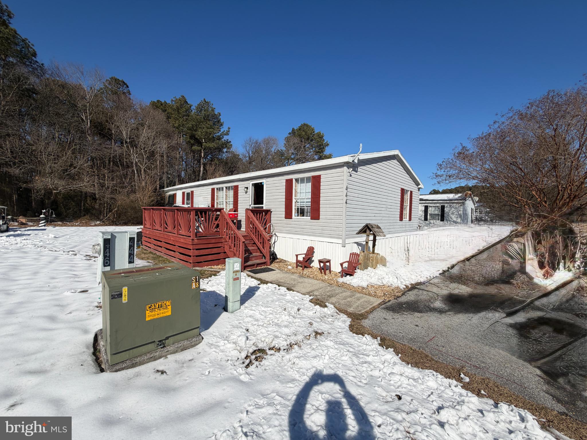 444 Long Branch Road Seaford, DE 19973 - Photo 3 of 22 Charming home nestled in a winter landscape.