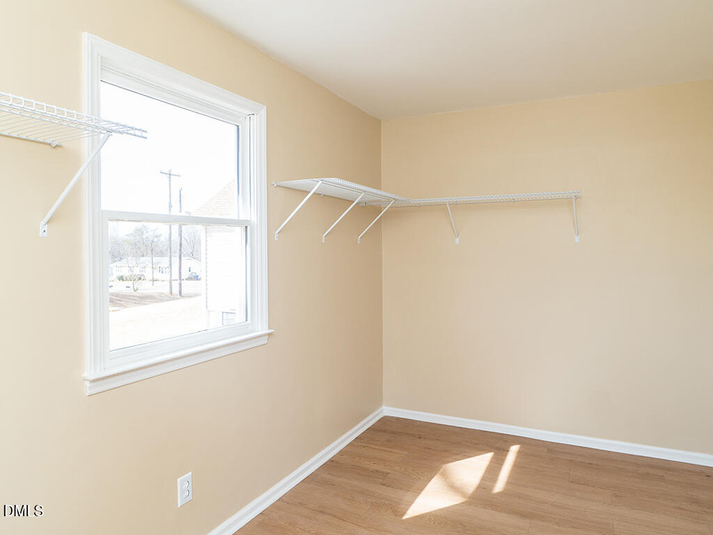 512 Monroe Holt Road Graham, NC 27253 - Photo 22 of 49 23 512_MonroeHoltRd PrimaryCloset1_MLS