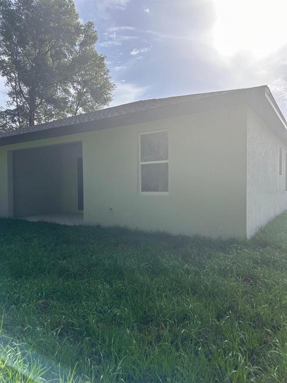 1575 South Montgomery Street DeLand, FL 32720 - Photo 10 of 12 a view of a backyard