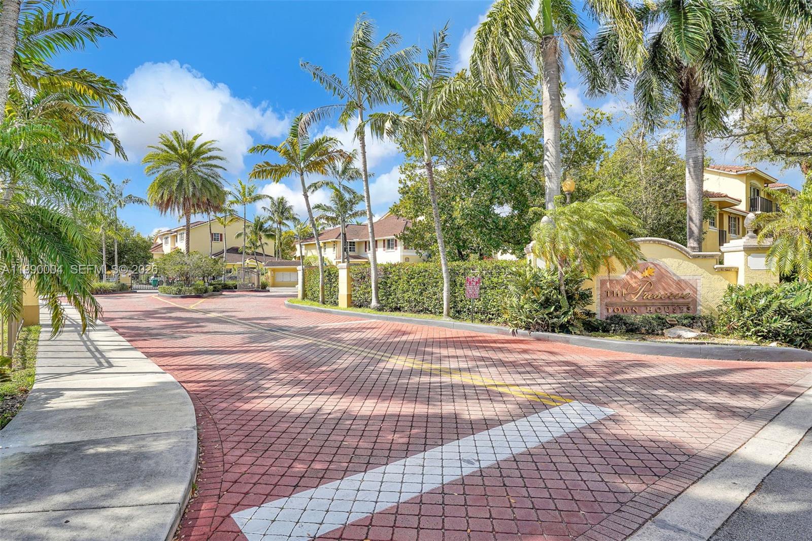 738 Northeast 90th Street, Unit 207 Miami, FL 33138 - Photo 26 of 31 a view of a backyard of a house