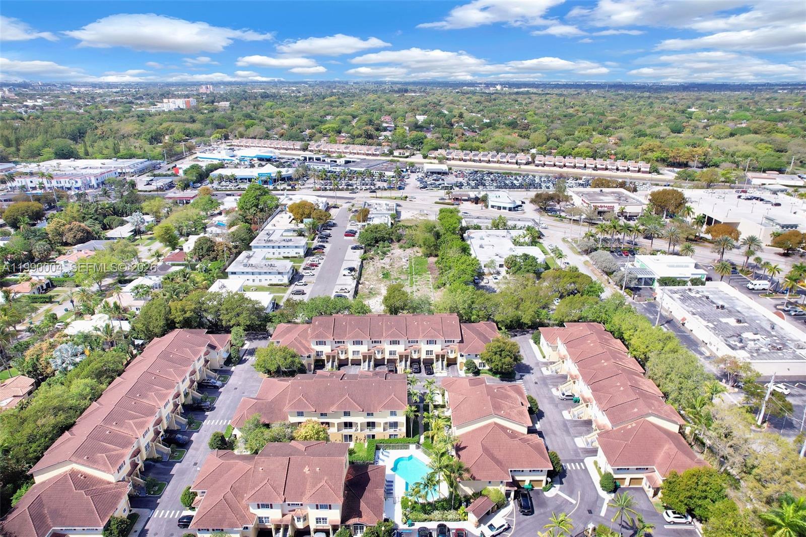 738 Northeast 90th Street, Unit 207 Miami, FL 33138 - Photo 30 of 31 an aerial view of residential houses with outdoor space
