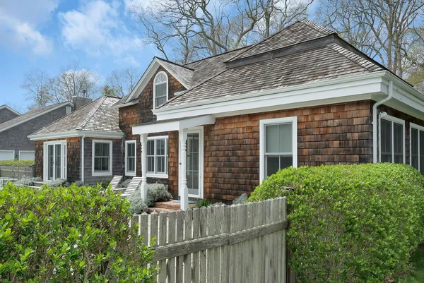 front view of a house with a small yard