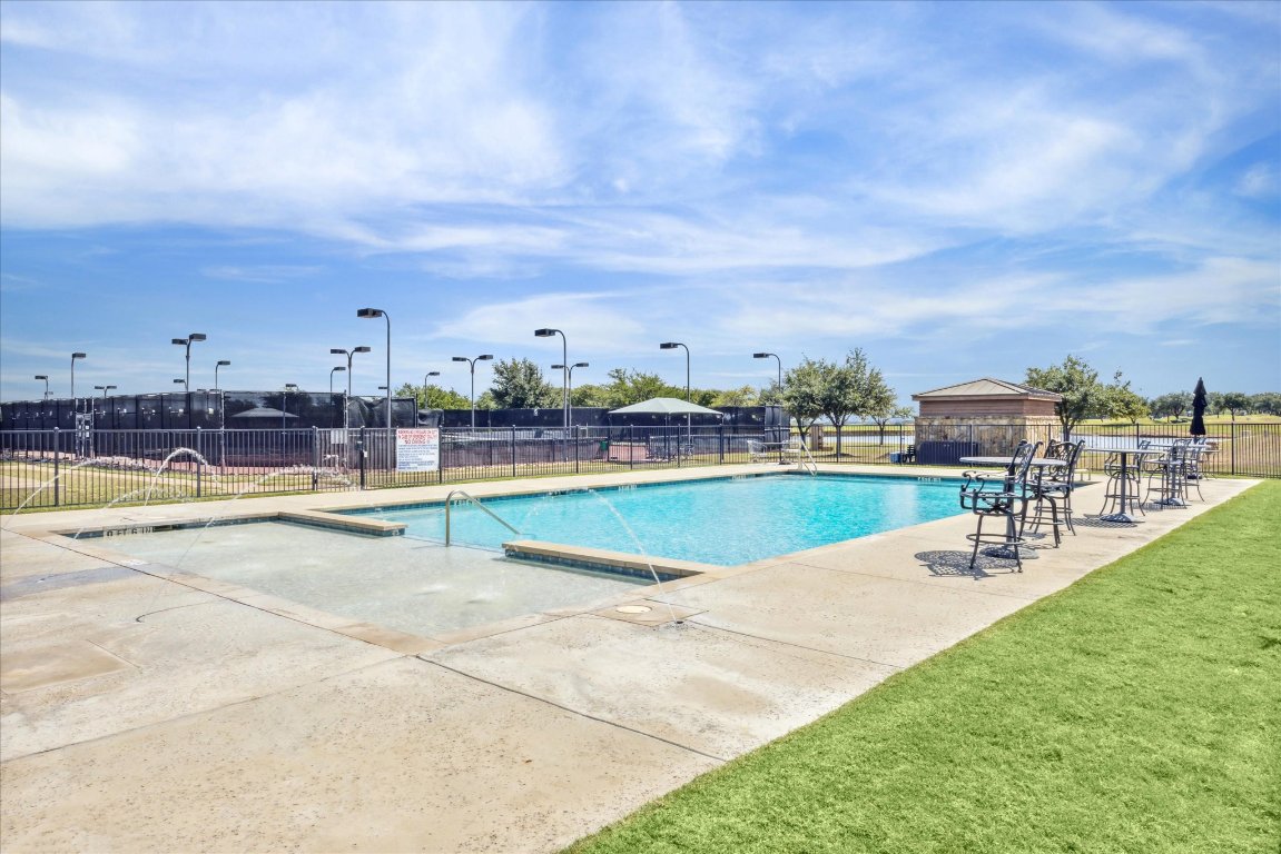 25409 Cliff Crossing Spicewood, TX 78669 - Photo 11 of 11 a view of a swimming pool and an outdoor seating