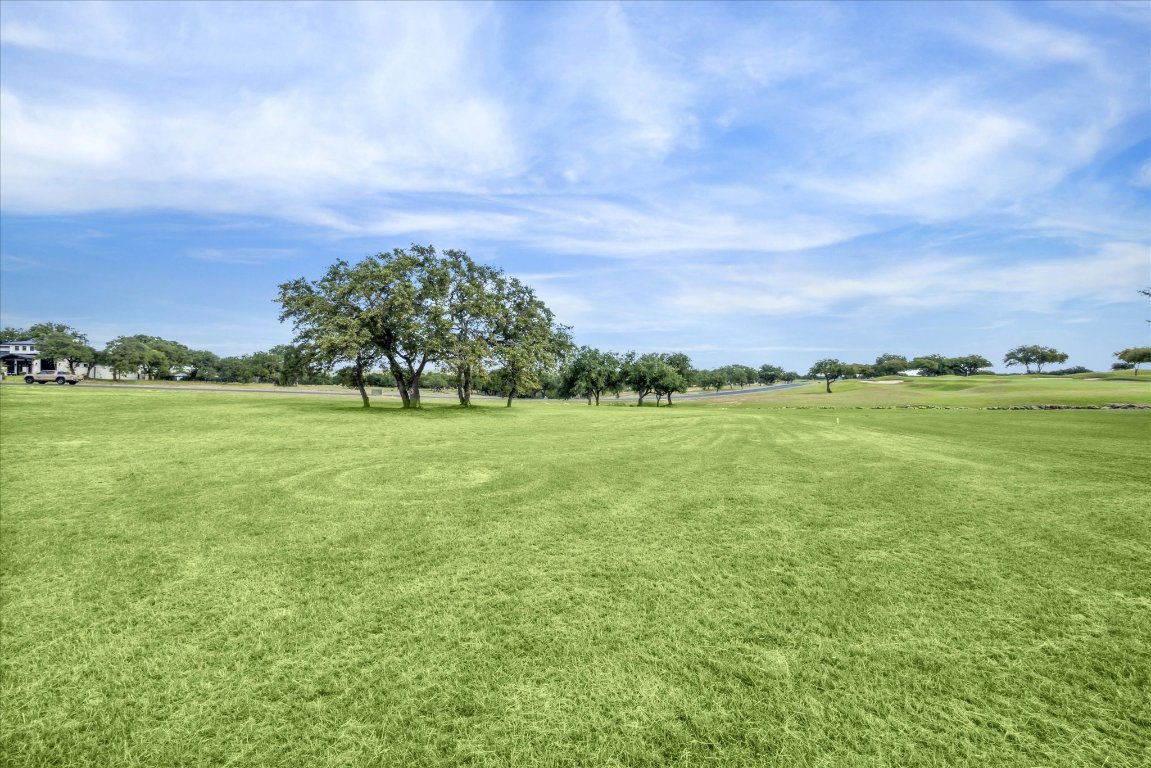 25409 Cliff Crossing Spicewood, TX 78669 - Photo 6 of 11 a view of a field with an ocean