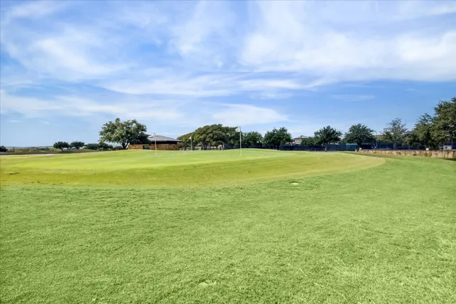 a view of a lake and a yard