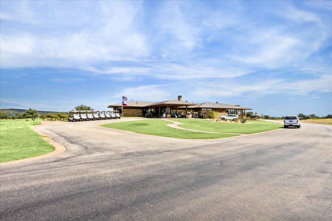 25409 Cliff Crossing Spicewood, TX 78669 - Photo 8 of 11 an aerial view of a house with a yard
