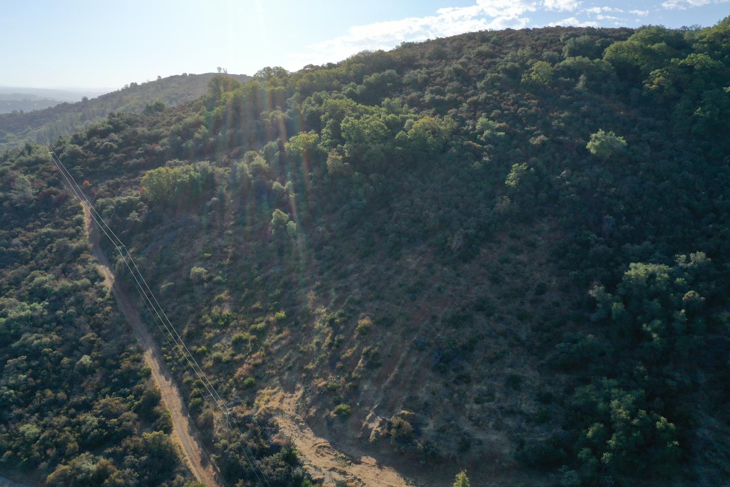 645 Kanaka Valley Road Rescue, CA 95672 - Photo 18 of 47 a view of a dry yard with green space