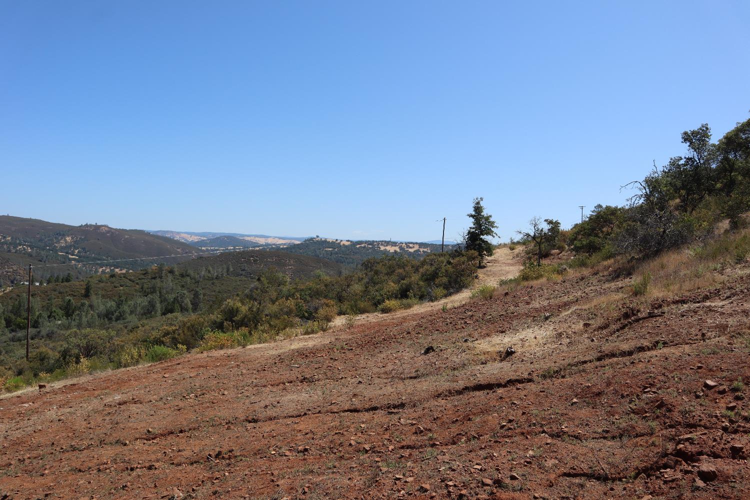 645 Kanaka Valley Road Rescue, CA 95672 - Photo 25 of 47 a view of a road with a mountain in the background