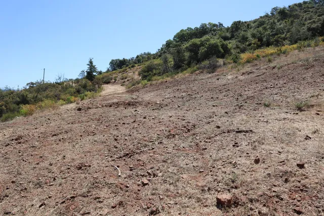 a view of a lake with mountains in the background