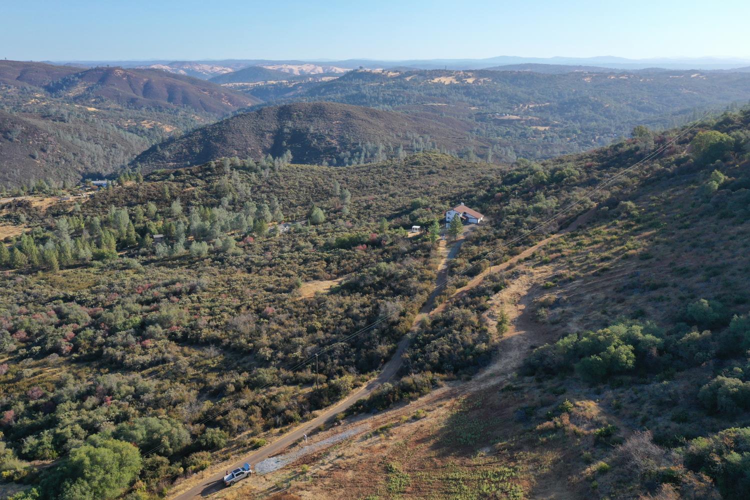 645 Kanaka Valley Road Rescue, CA 95672 - Photo 8 of 47 a view of a dry field with lots of bushes