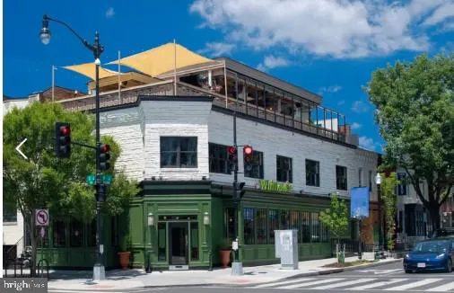a front view of a building and a street