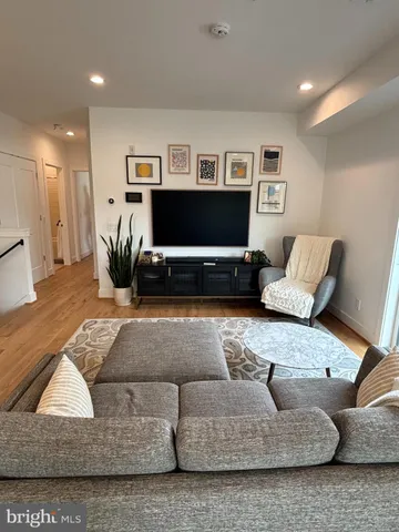 a living room with furniture and a couch