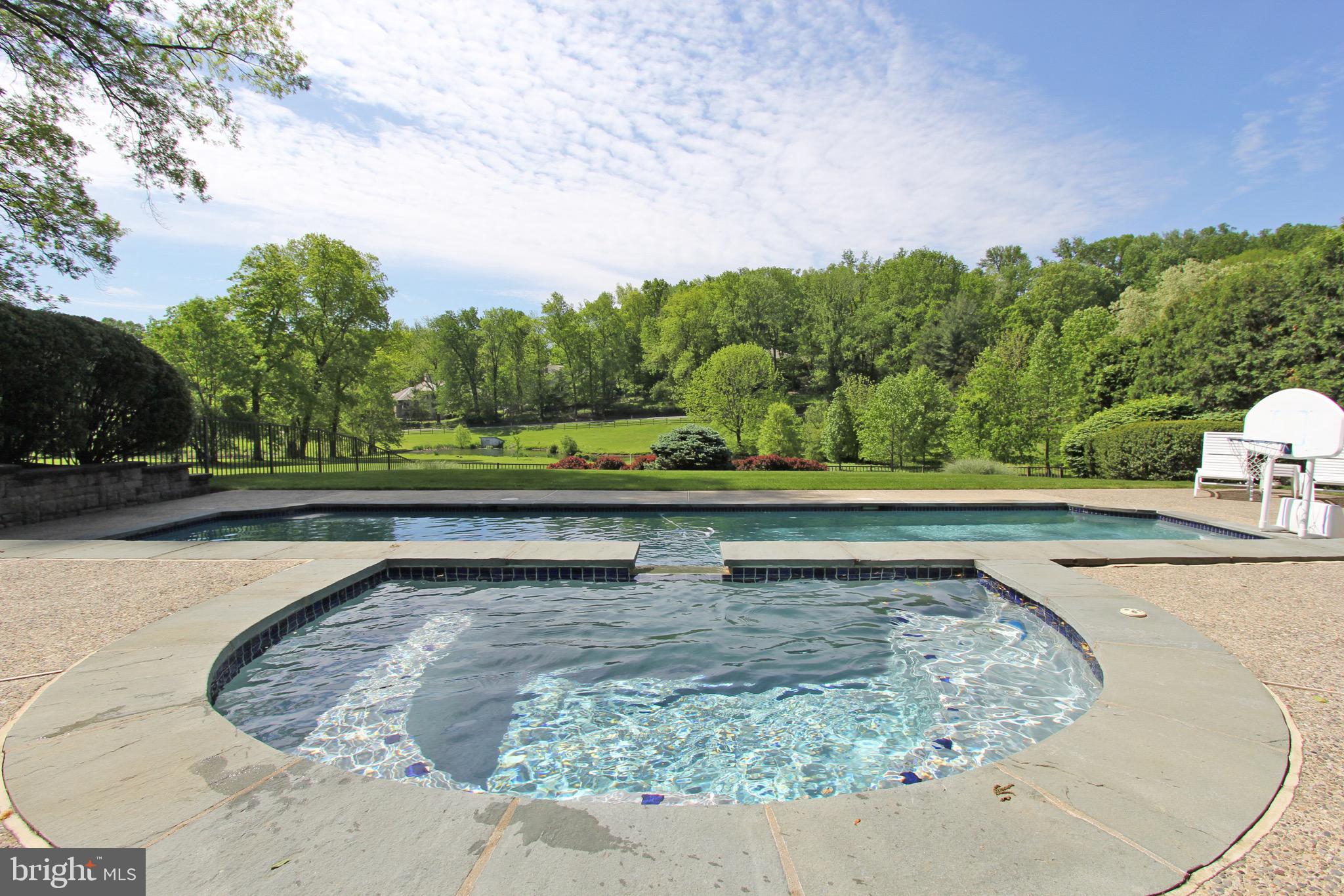 312 Julip Run Wayne, PA 19087 - Photo 27 of 60 pool with hot tub and cascading water feature
