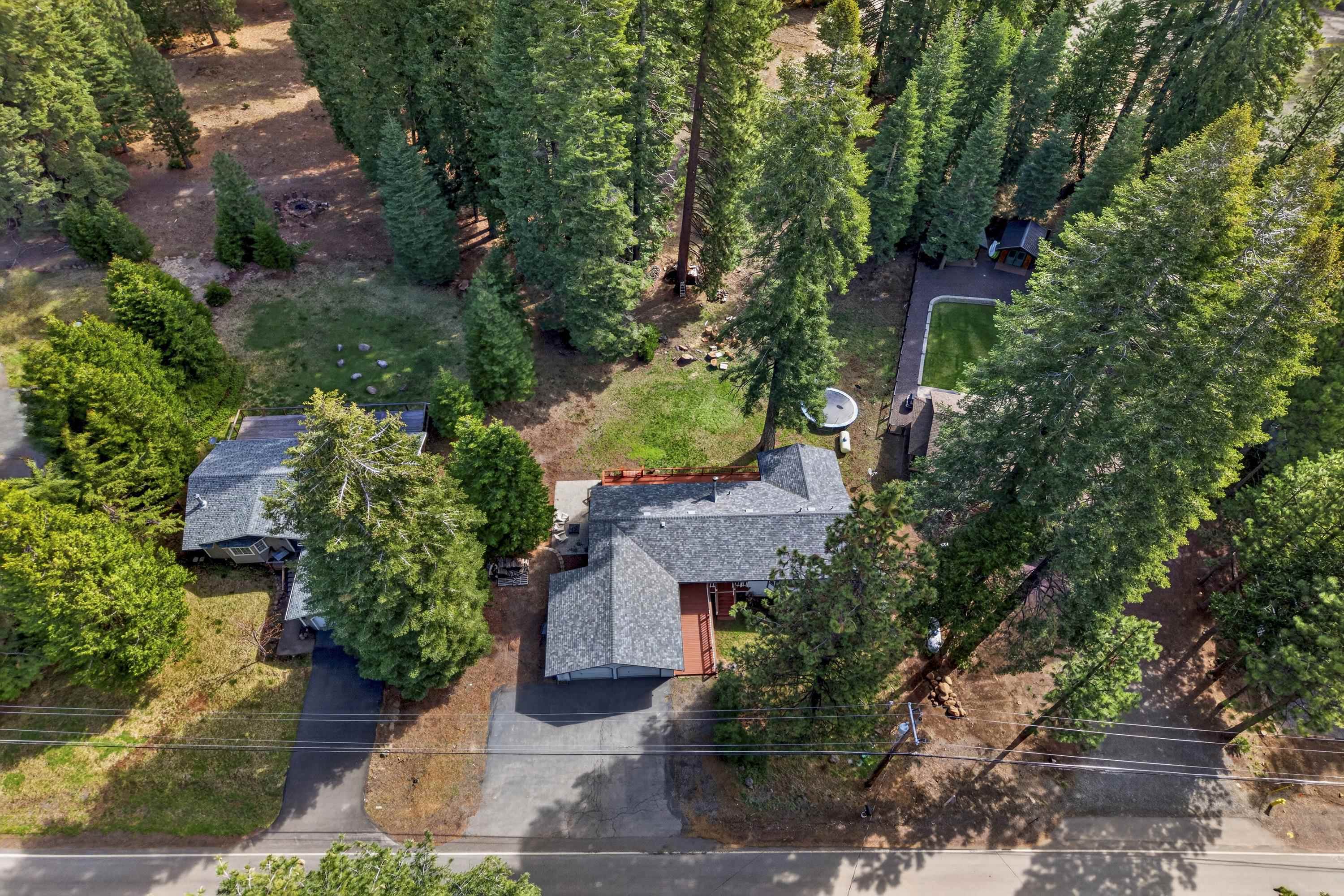 811 Golf Club Road Lake Almanor, CA 96137 - Photo 38 of 42 an aerial view of a house with a yard
