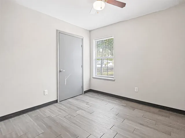 an empty room with windows