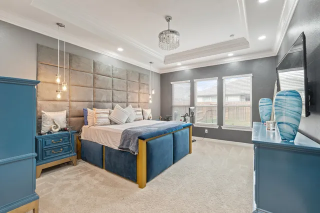 a bed room with bed and window