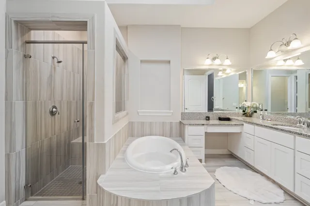 a room with a sink and a mirror