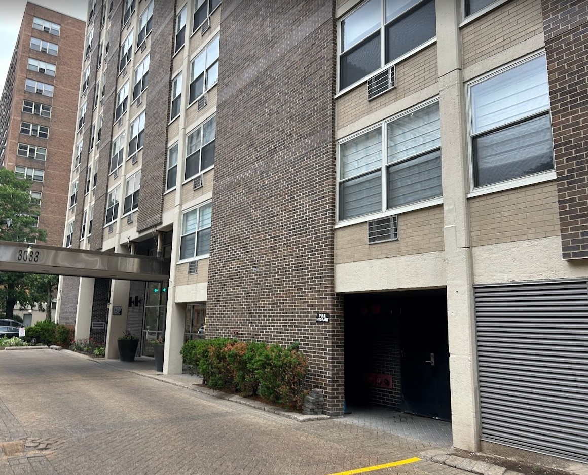 3033 North Sheridan Road, Unit CP9 Chicago, IL 60657 - Photo 1 of 6 a front view of a building with a window and a ceiling fan