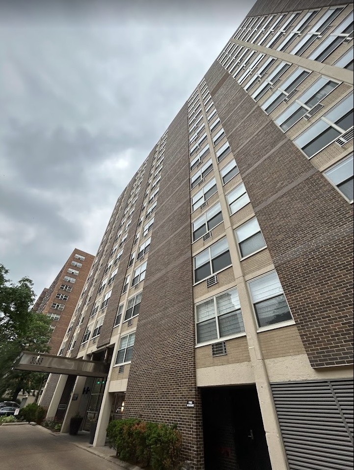 3033 North Sheridan Road, Unit CP9 Chicago, IL 60657 - Photo 2 of 6 a view of buildings with wooden floor